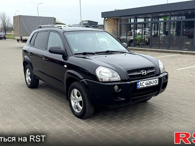 Черный Хендай Туксон, объемом двигателя 2 л и пробегом 200 тыс. км за 7800 $, фото 1 на Automoto.ua