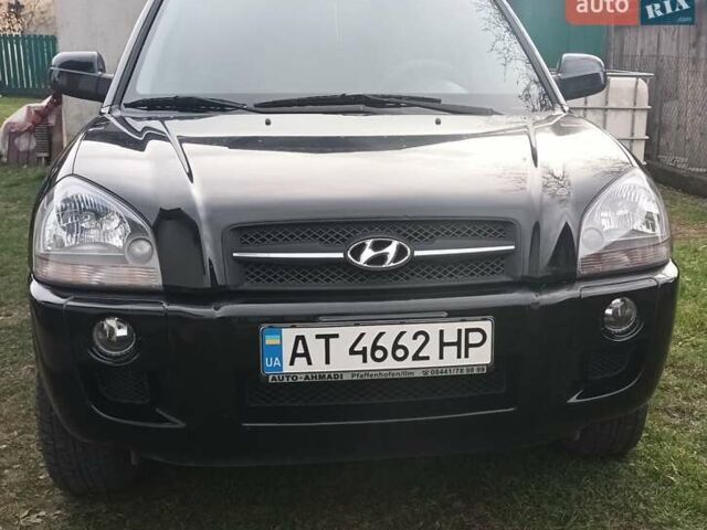 Черный Хендай Туксон, объемом двигателя 2 л и пробегом 247 тыс. км за 6300 $, фото 1 на Automoto.ua