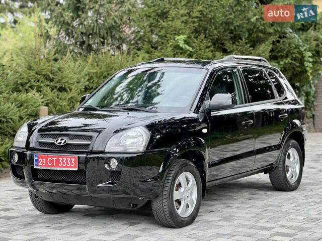 Черный Хендай Туксон, объемом двигателя 2 л и пробегом 187 тыс. км за 7550 $, фото 1 на Automoto.ua