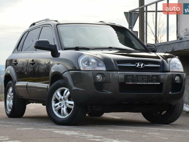 Черный Хендай Туксон, объемом двигателя 2 л и пробегом 183 тыс. км за 9150 $, фото 1 на Automoto.ua