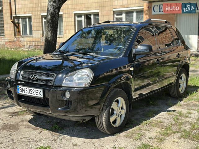 Чорний Хендай Туксон, об'ємом двигуна 2 л та пробігом 165 тис. км за 8500 $, фото 1 на Automoto.ua