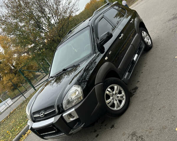 Хендай Туксон 2007 в Каменское - Днепродзержинск на Automoto.ua Черный Хендай Туксон, объемом двигателя 1.98 л и пробегом 162 тыс. км за 7999 $, фото 1 на Automoto.ua