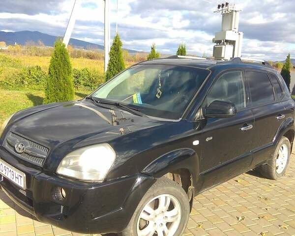 Черный Хендай Туксон, объемом двигателя 2 л и пробегом 277 тыс. км за 7900 $, фото 1 на Automoto.ua
