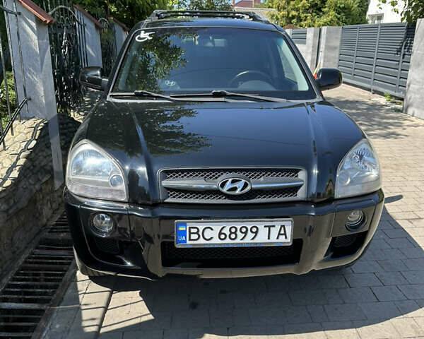 Чорний Хендай Туксон, об'ємом двигуна 1.98 л та пробігом 188 тис. км за 7000 $, фото 1 на Automoto.ua
