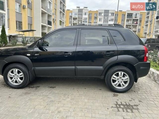 Черный Хендай Туксон, объемом двигателя 1.98 л и пробегом 147 тыс. км за 8000 $, фото 1 на Automoto.ua