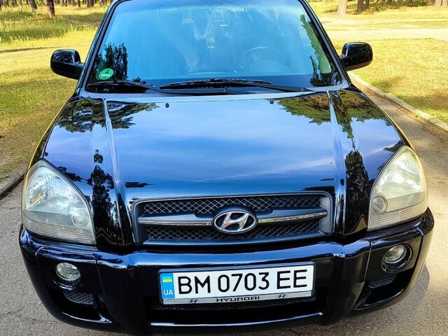 Черный Хендай Туксон, объемом двигателя 2 л и пробегом 270 тыс. км за 7800 $, фото 1 на Automoto.ua