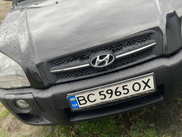 Чорний Хендай Туксон, об'ємом двигуна 2 л та пробігом 230 тис. км за 5999 $, фото 1 на Automoto.ua