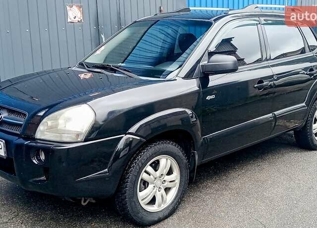 Чорний Хендай Туксон, об'ємом двигуна 2 л та пробігом 308 тис. км за 7555 $, фото 1 на Automoto.ua