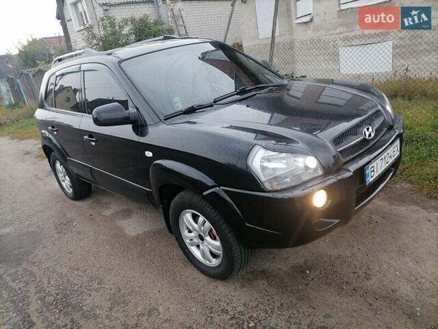 Черный Хендай Туксон, объемом двигателя 1.98 л и пробегом 238 тыс. км за 8400 $, фото 1 на Automoto.ua