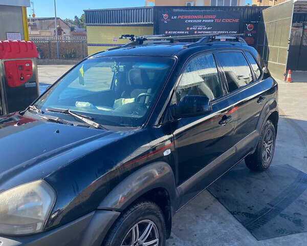 Чорний Хендай Туксон, об'ємом двигуна 1.98 л та пробігом 215 тис. км за 7540 $, фото 1 на Automoto.ua