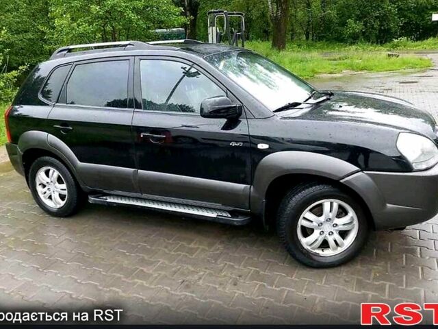 Черный Хендай Туксон, объемом двигателя 2 л и пробегом 193 тыс. км за 8000 $, фото 1 на Automoto.ua