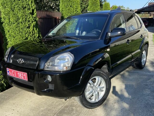 Черный Хендай Туксон, объемом двигателя 2 л и пробегом 197 тыс. км за 8400 $, фото 1 на Automoto.ua