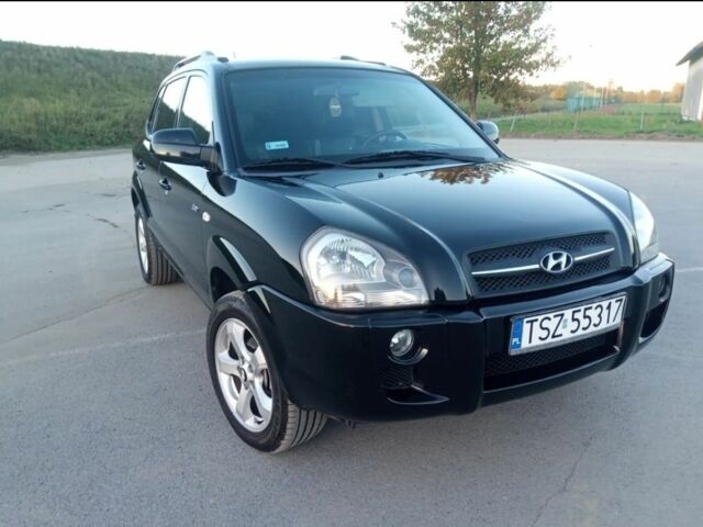 Черный Хендай Туксон, объемом двигателя 2 л и пробегом 240 тыс. км за 2700 $, фото 1 на Automoto.ua