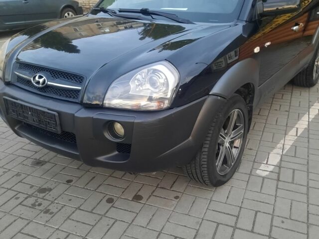 Черный Хендай Туксон, объемом двигателя 2 л и пробегом 1 тыс. км за 8500 $, фото 1 на Automoto.ua