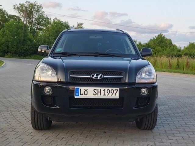 Черный Хендай Туксон, объемом двигателя 2 л и пробегом 232 тыс. км за 1700 $, фото 1 на Automoto.ua