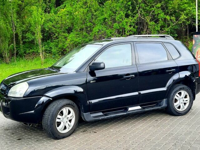 Чорний Хендай Туксон, об'ємом двигуна 2 л та пробігом 175 тис. км за 8900 $, фото 1 на Automoto.ua