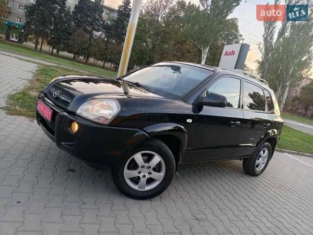 Чорний Хендай Туксон, об'ємом двигуна 1.98 л та пробігом 192 тис. км за 7950 $, фото 1 на Automoto.ua