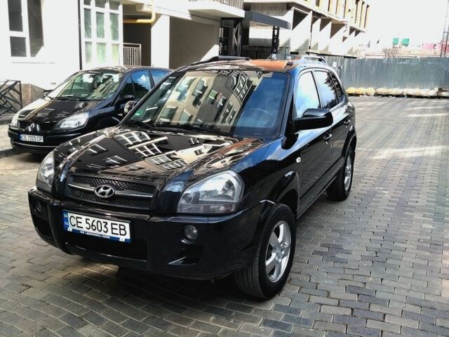 Чорний Хендай Туксон, об'ємом двигуна 2 л та пробігом 190 тис. км за 7500 $, фото 1 на Automoto.ua