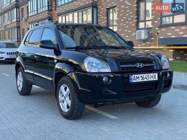 Черный Хендай Туксон, объемом двигателя 1.98 л и пробегом 286 тыс. км за 7300 $, фото 1 на Automoto.ua