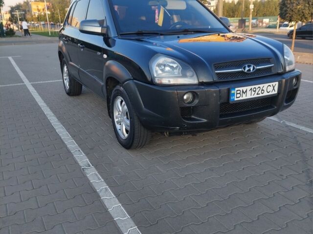 Черный Хендай Туксон, объемом двигателя 2 л и пробегом 289 тыс. км за 6600 $, фото 1 на Automoto.ua