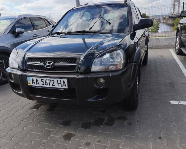 Черный Хендай Туксон, объемом двигателя 2 л и пробегом 158 тыс. км за 7500 $, фото 1 на Automoto.ua