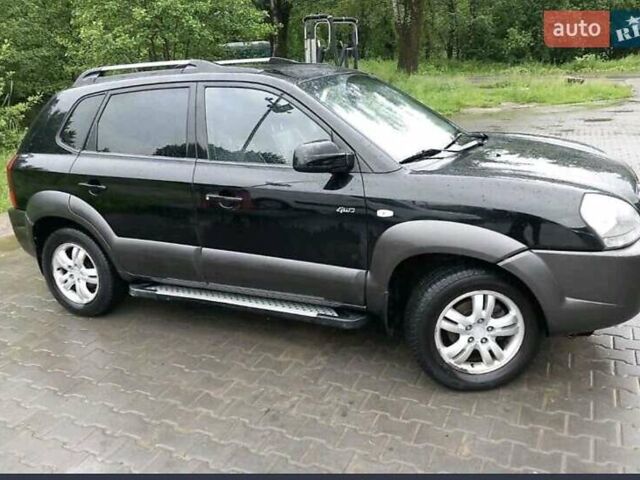 Черный Хендай Туксон, объемом двигателя 1.98 л и пробегом 193 тыс. км за 8000 $, фото 1 на Automoto.ua