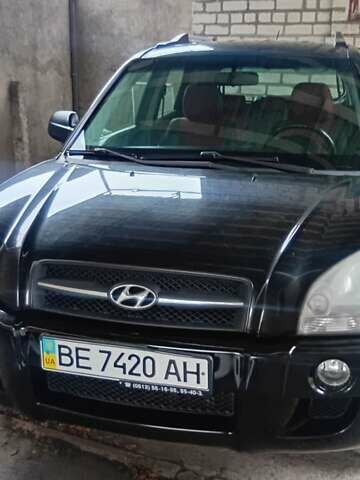 Черный Хендай Туксон, объемом двигателя 1.98 л и пробегом 218 тыс. км за 7800 $, фото 1 на Automoto.ua