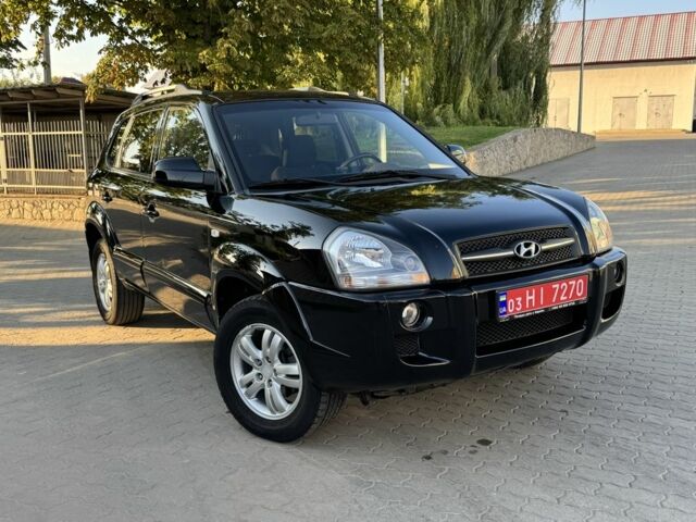 Черный Хендай Туксон, объемом двигателя 2 л и пробегом 180 тыс. км за 7800 $, фото 1 на Automoto.ua