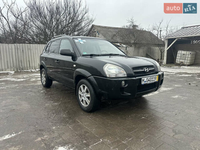 Черный Хендай Туксон, объемом двигателя 2 л и пробегом 225 тыс. км за 5000 $, фото 1 на Automoto.ua
