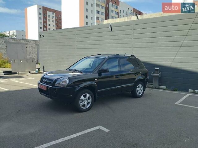 Чорний Хендай Туксон, об'ємом двигуна 1.98 л та пробігом 203 тис. км за 8500 $, фото 1 на Automoto.ua