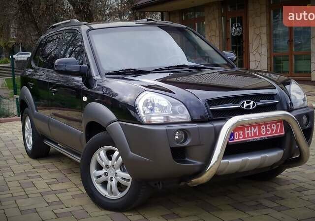 Чорний Хендай Туксон, об'ємом двигуна 2 л та пробігом 229 тис. км за 8600 $, фото 1 на Automoto.ua