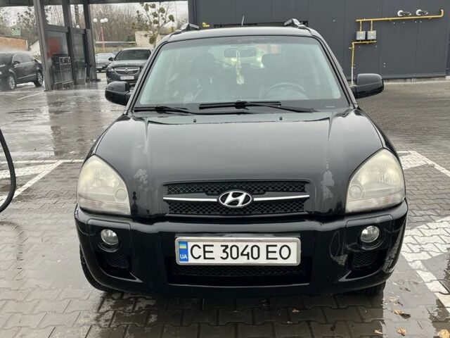 Черный Хендай Туксон, объемом двигателя 2 л и пробегом 177 тыс. км за 8500 $, фото 1 на Automoto.ua