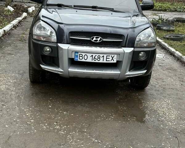 Черный Хендай Туксон, объемом двигателя 1.98 л и пробегом 273 тыс. км за 7400 $, фото 1 на Automoto.ua