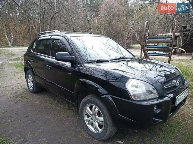 Черный Хендай Туксон, объемом двигателя 2 л и пробегом 240 тыс. км за 8200 $, фото 1 на Automoto.ua