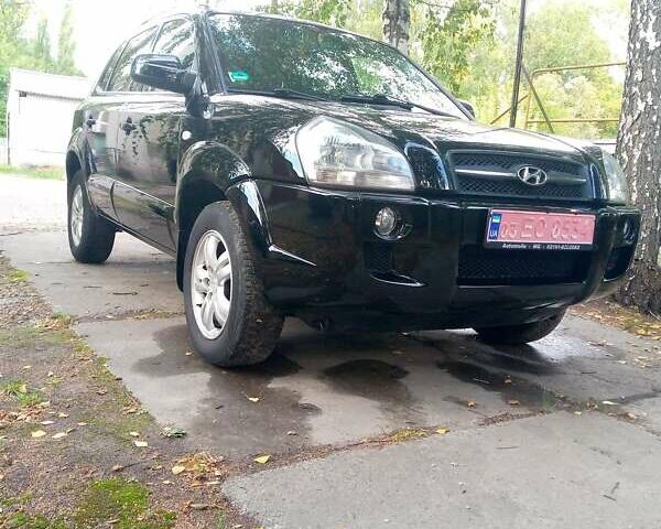 Черный Хендай Туксон, объемом двигателя 2 л и пробегом 224 тыс. км за 7900 $, фото 1 на Automoto.ua