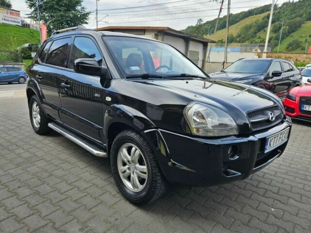 Черный Хендай Туксон, объемом двигателя 2 л и пробегом 287 тыс. км за 2400 $, фото 1 на Automoto.ua