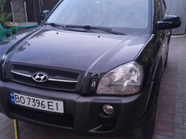 Черный Хендай Туксон, объемом двигателя 2 л и пробегом 209 тыс. км за 8200 $, фото 1 на Automoto.ua