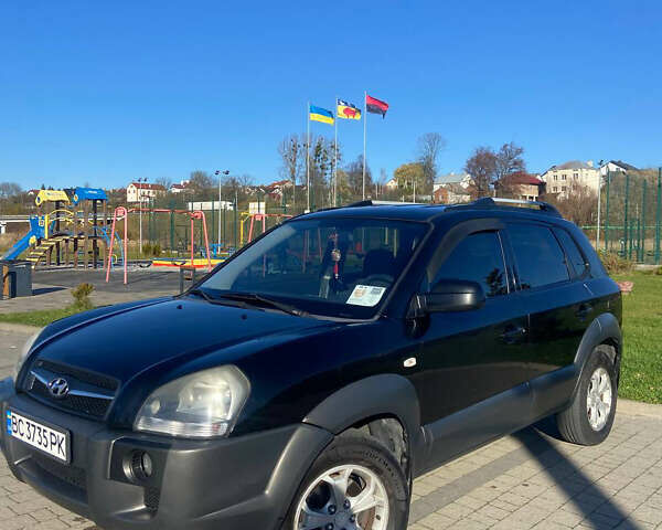 Чорний Хендай Туксон, об'ємом двигуна 1.99 л та пробігом 250 тис. км за 7800 $, фото 1 на Automoto.ua