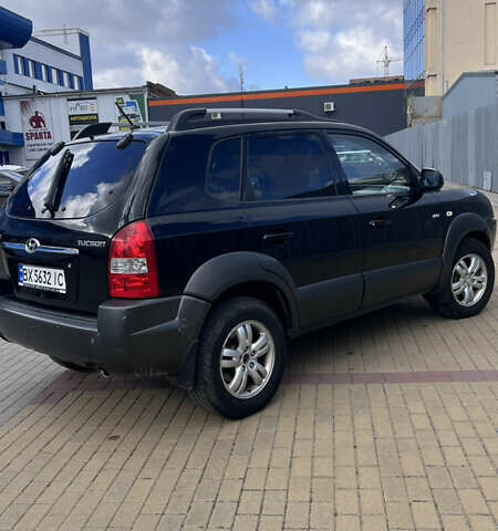 Черный Хендай Туксон, объемом двигателя 2 л и пробегом 322 тыс. км за 7700 $, фото 1 на Automoto.ua