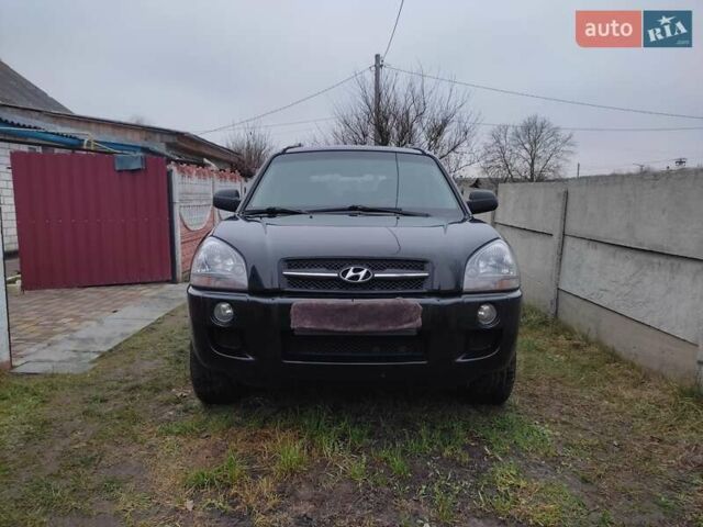 Черный Хендай Туксон, объемом двигателя 2 л и пробегом 237 тыс. км за 7500 $, фото 1 на Automoto.ua