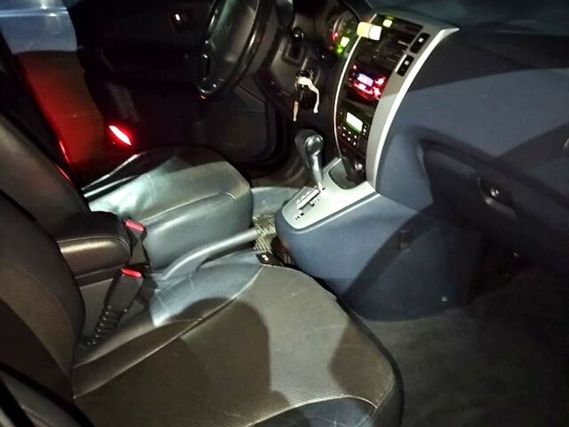 Чорний Хендай Туксон, об'ємом двигуна 2 л та пробігом 226 тис. км за 4720 $, фото 1 на Automoto.ua