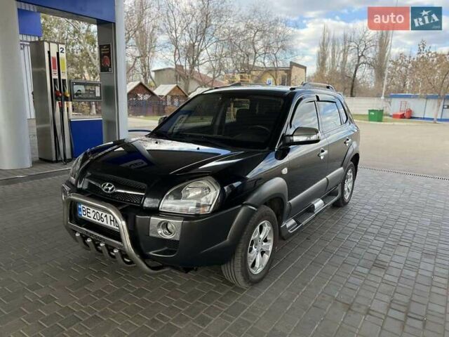 Чорний Хендай Туксон, об'ємом двигуна 2 л та пробігом 123 тис. км за 8300 $, фото 1 на Automoto.ua
