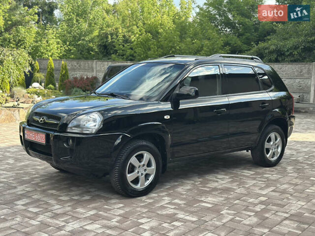 Черный Хендай Туксон, объемом двигателя 2 л и пробегом 218 тыс. км за 8700 $, фото 1 на Automoto.ua