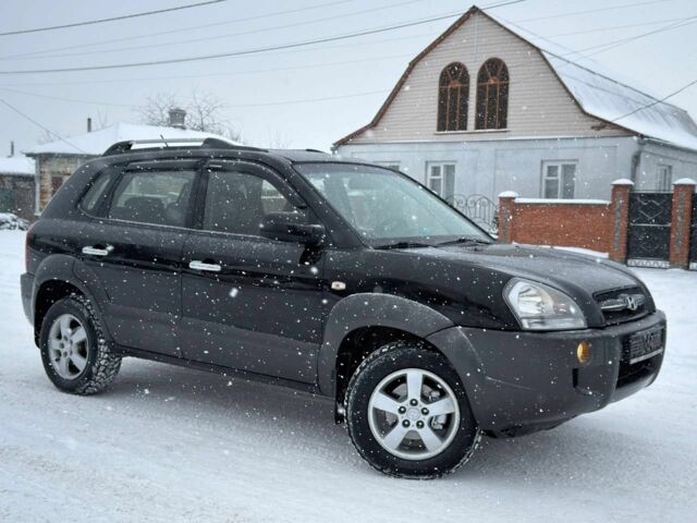 Черный Хендай Туксон, объемом двигателя 2 л и пробегом 175 тыс. км за 8699 $, фото 1 на Automoto.ua