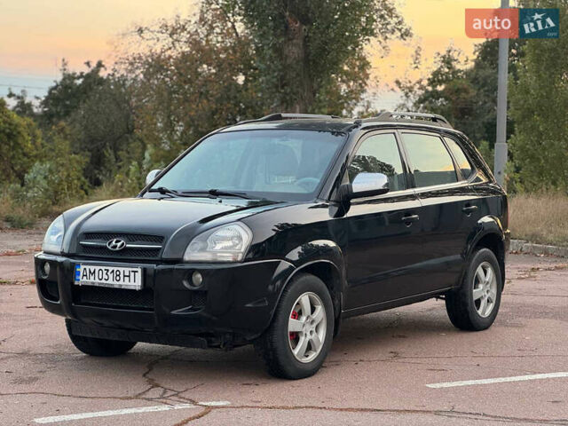 Черный Хендай Туксон, объемом двигателя 2 л и пробегом 361 тыс. км за 6499 $, фото 1 на Automoto.ua
