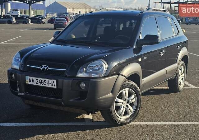 Чорний Хендай Туксон, об'ємом двигуна 1.98 л та пробігом 212 тис. км за 7766 $, фото 1 на Automoto.ua