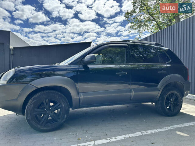 Чорний Хендай Туксон, об'ємом двигуна 1.98 л та пробігом 279 тис. км за 8200 $, фото 1 на Automoto.ua