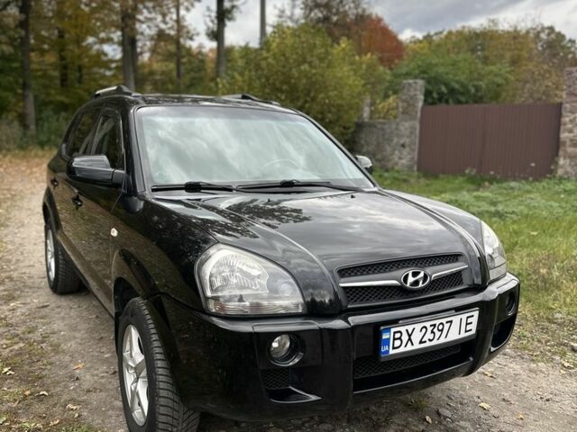 Черный Хендай Туксон, объемом двигателя 2 л и пробегом 161 тыс. км за 7599 $, фото 1 на Automoto.ua