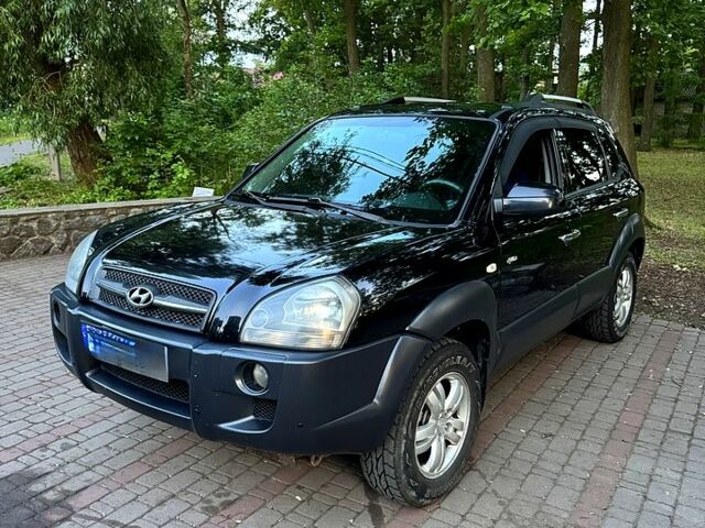 Чорний Хендай Туксон, об'ємом двигуна 2 л та пробігом 267 тис. км за 8200 $, фото 1 на Automoto.ua