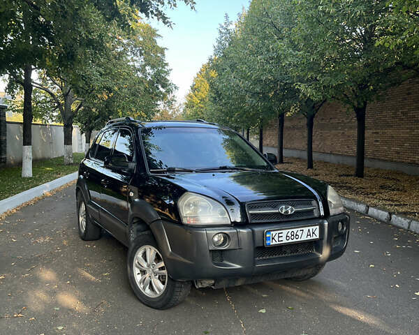 Черный Хендай Туксон, объемом двигателя 2.66 л и пробегом 256 тыс. км за 7600 $, фото 1 на Automoto.ua